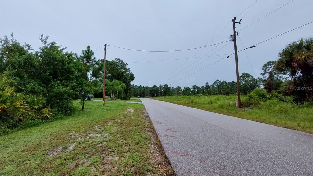 Photo of 1153 Dutchess Street E, Lehigh Acres, FL 33974 (MLS # O6338728)