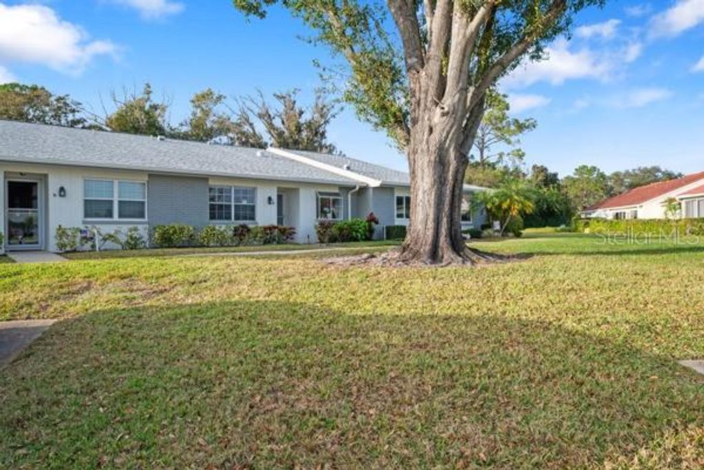Photo of 3351 Stonehaven Court W #C, Palm Harbor, FL 34684 (MLS # TB8464588)