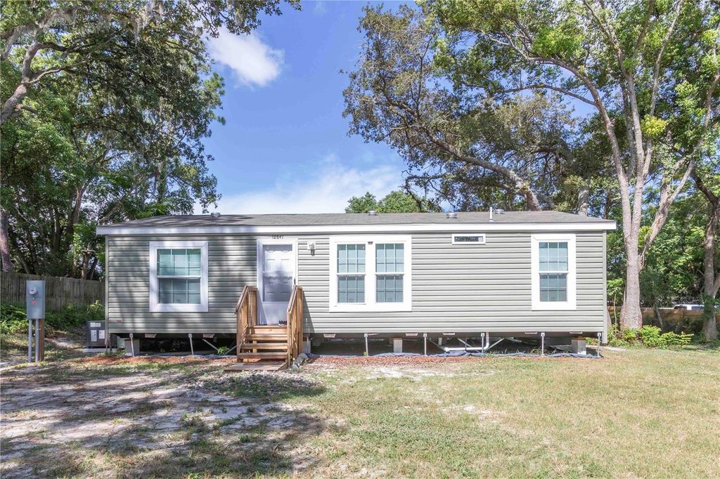 Photo of 12841 Hicks Road, Hudson, FL 34669 (MLS # W7878434)