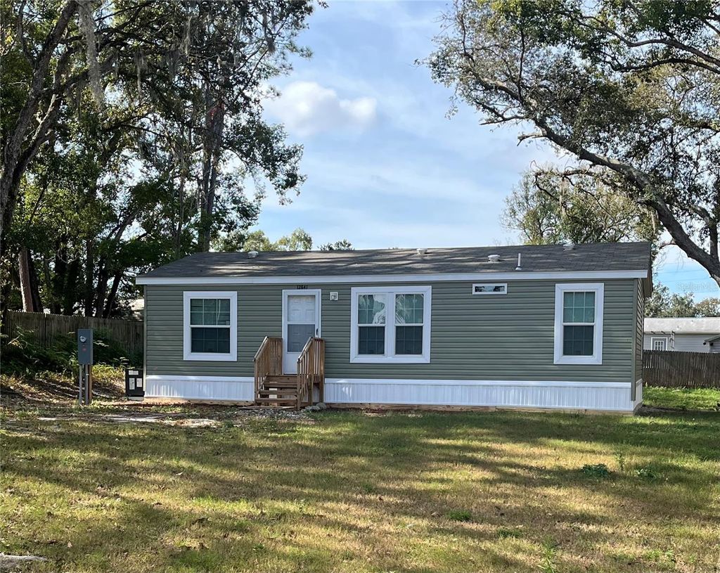 Photo of 12841 Hicks Road, Hudson, FL 34669 (MLS # W7878434)