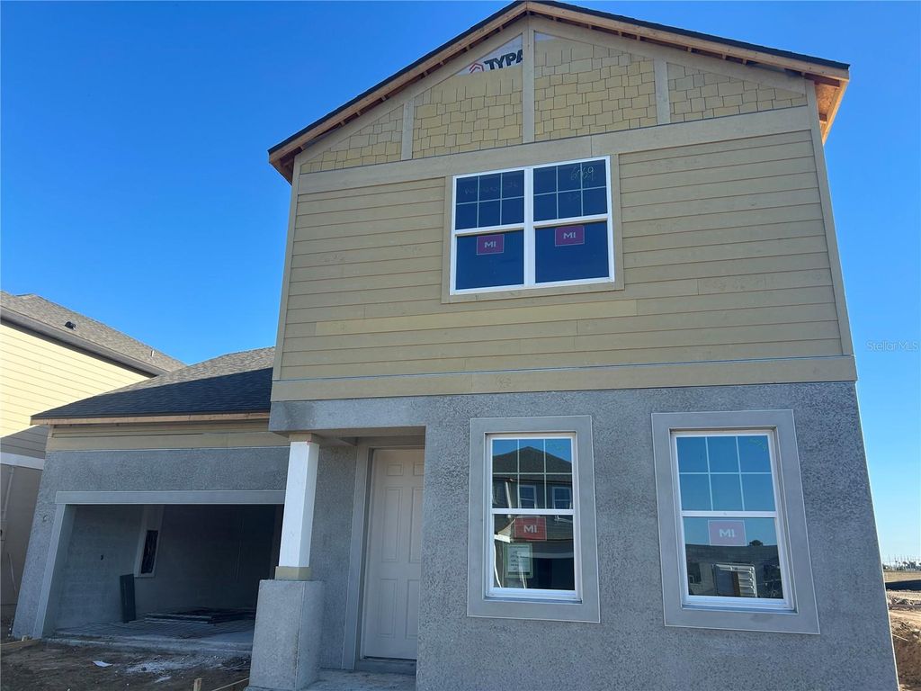 Photo of 10167 Hidden Hammock Loop, Parrish, FL 34219 (MLS # TB8451216)