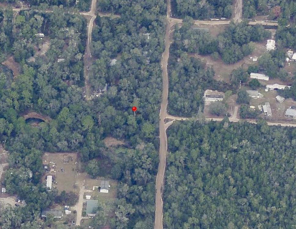 Discover this prime vacant lot located in Ocklawaha, FL—an excellent opportunity to build your dream home or invest in land in a peaceful, natural setting. Great opportunity for an investment and zoned for mixed use (R4) allowing manufactured homes and single-family residence. High and dry lot. Come build your dream home!