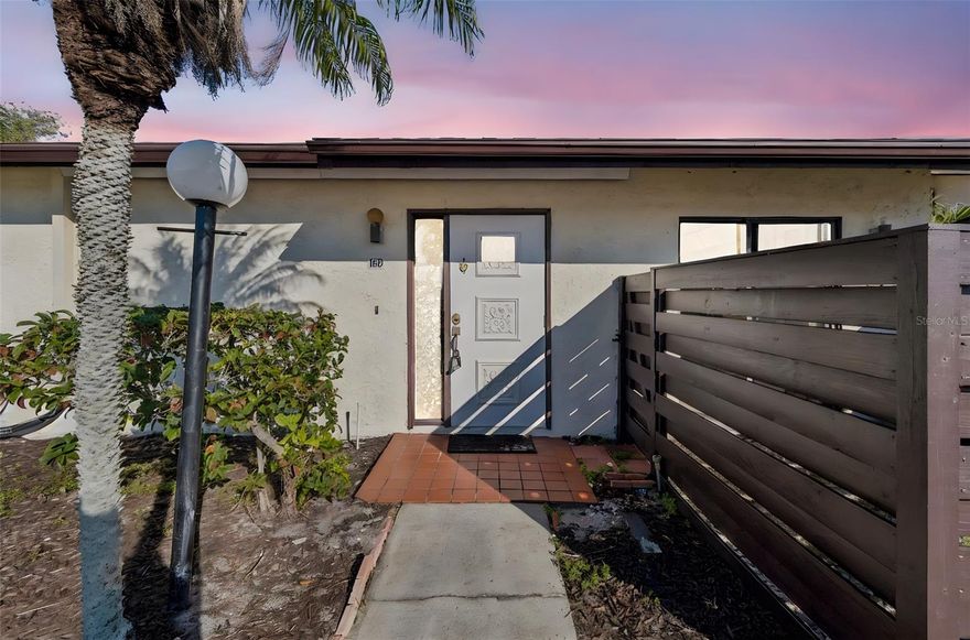 Featuring a popular split-plan layout, this 2-bedroom, 2-bathroom one story 1st floor villa (no one above or below you) offers the perfect balance of privacy and togetherness. The moment you step inside, you’ll be struck by the airy, open feel of the vaulted ceilings and a spacious floor plan. You will even have your own carport out front!
The heart of the home flows seamlessly out to a large screened lanai. Whether you’re sipping your morning coffee or unwinding with a book in the evening, the serene pond view provides a backdrop of pure tranquility.
This condo is being sold turnkey furnished, so you can start enjoying the Florida lifestyle from day one. It even includes a full-sized washer and dryer in a dedicated laundry and storage room conveniently located off the lanai. While it’s ready to go, there is plenty of potential to add your own personal touch and truly make it yours.
Located in a vibrant 55+ community, you’ll have access to a lifestyle that keeps you as active or as relaxed as you choose. Take a dip in one of the two sparkling pools, challenge your neighbors to a game of shuffleboard, or head over to the clubhouse for social events. The grounds are beautifully maintained, featuring winding paths and scenic ponds throughout.
Location is everything, and this villa puts you exactly where you want to be. You are just a short drive away from:
Pristine Gulf beaches for sunset strolls.
A variety of local restaurants and premium shopping.
The airport, making travel or hosting visiting family a breeze.