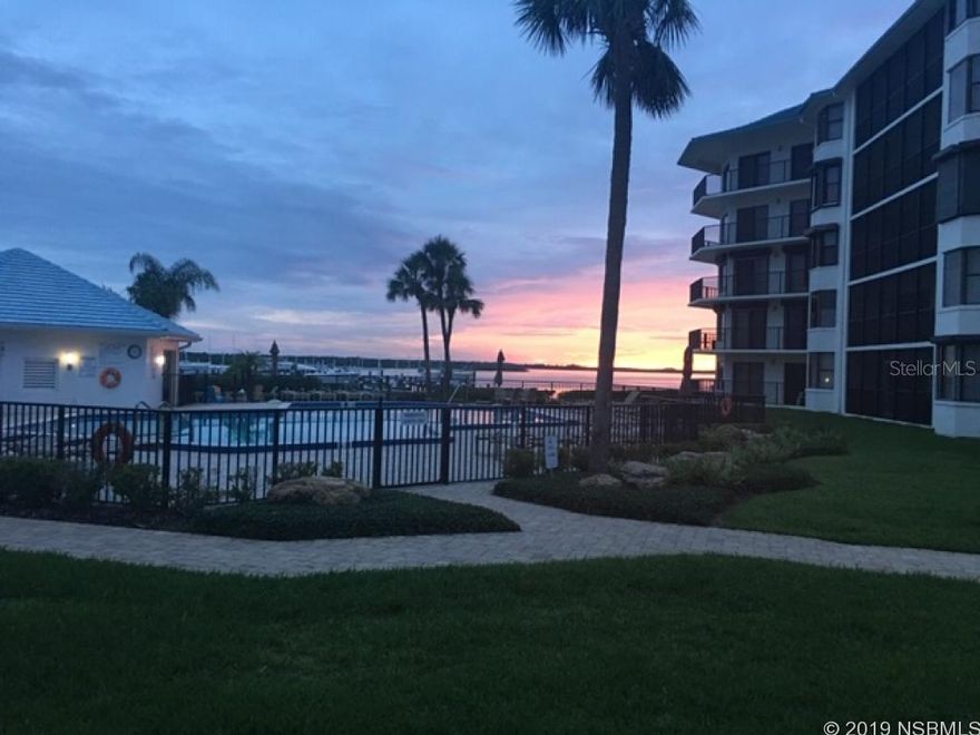 Beautiful first floor unit in Marina Villa- quick out the cut if your a boater!  Walk right outside and be at the Pool.  Dock space available for rental.  Master Bath recently upgraded and very lovely. Custom Kitchen from Bali with seating bar and beautiful floors throughout! Spacious and open plan, you will love your retreat at the beach.The 64 deep water marina, beautiful pool area and barbecue areas are inviting.  Outside condo association has just replaced the roofs with blue metal. ;Water: City