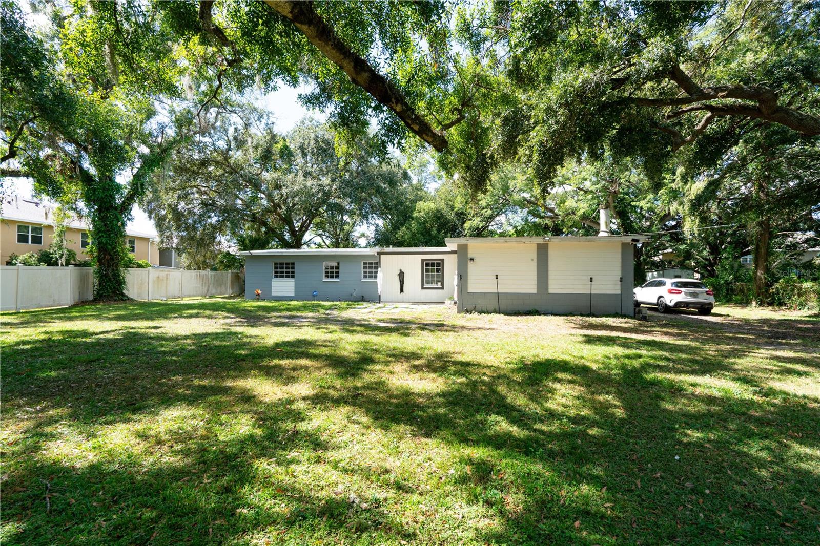 Come own your private piece of paradise located in a very quiet area. This inviting 3 beds and 2 baths, move-in-ready home with Multifamily Potential in a spacious 1/2-acre lot is the perfect choice for first-time homeowners or investors home!!  A recent and comprehensive renovation has breathed new life into this residence, transforming it into a haven of contemporary elegance. Upon entering, you're greeted by a seamlessly integrated living space that exudes warmth and sophistication. The attention to detail in the design is evident, with a seamless flow connecting the living, dining, and kitchen areas. The entire home features modern LED lighting and both bathrooms have been renovated with high-end finishes, also include a new roof 2023, new Water Heater and new A/C. There is no HOA or CDs. This is a great property to host large family functions or use to setup a workshop. Your possibilities are endless. Schedule your showing now!!!