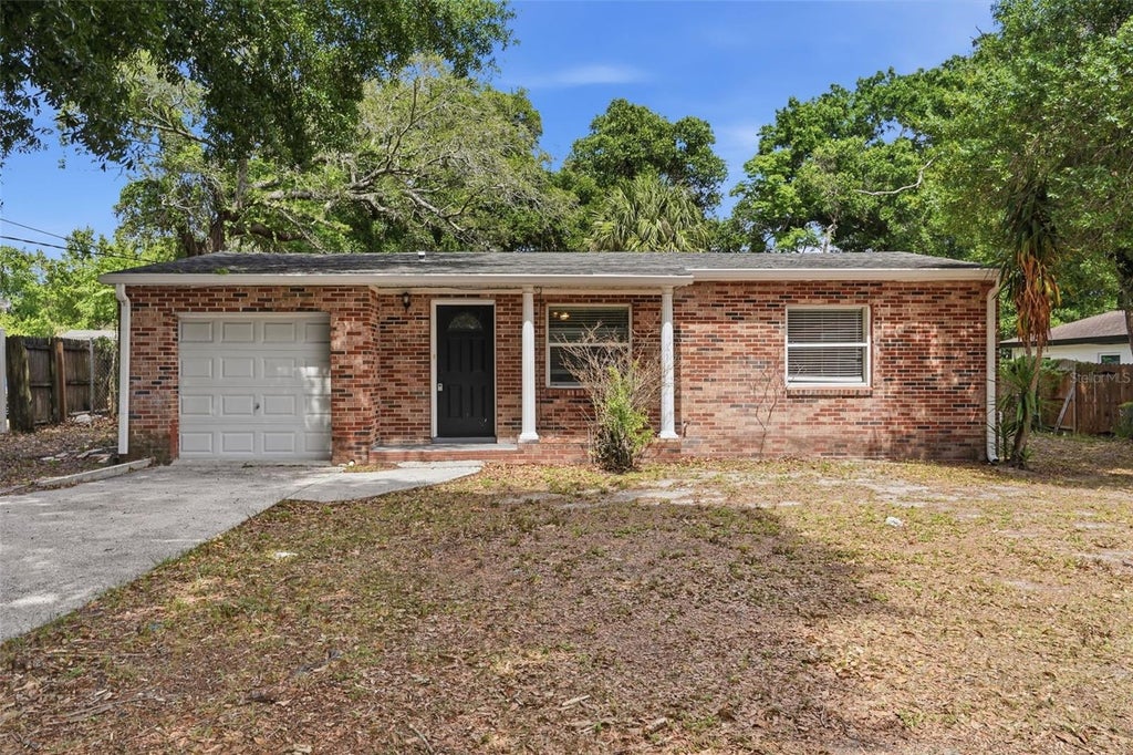 Photo of 1011 Santa Barbara Road, Orlando, FL 32808 (MLS # O6404866)