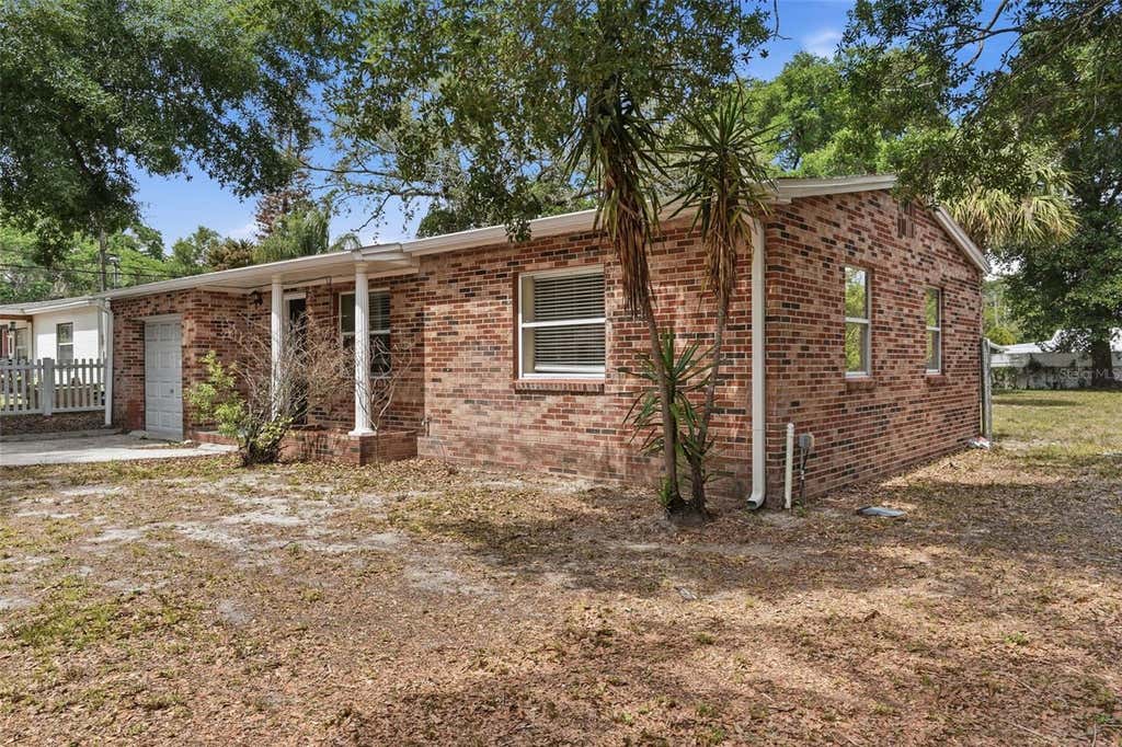 Photo of 1011 Santa Barbara Road, Orlando, FL 32808 (MLS # O6404866)