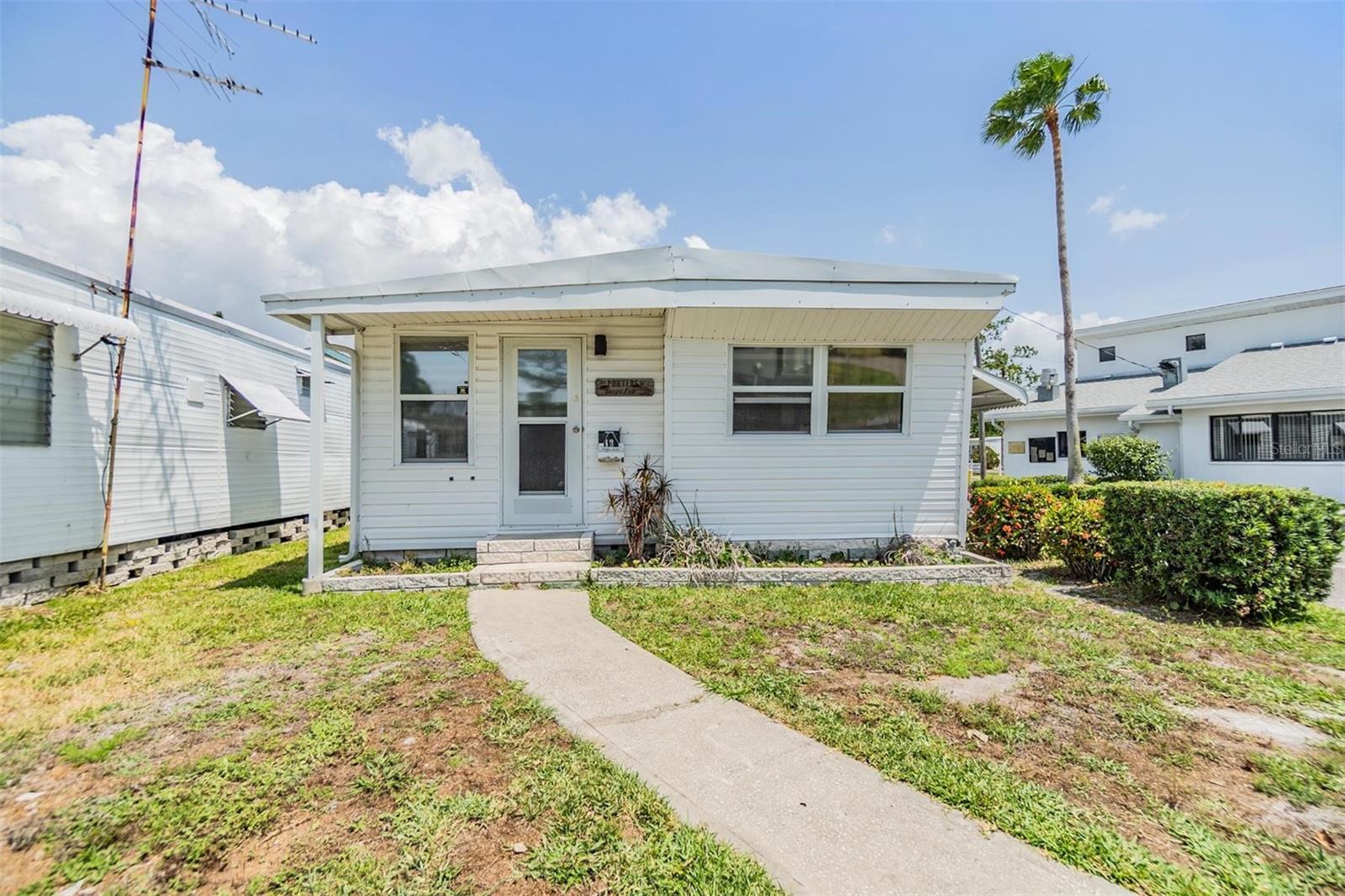 Welcome to this beautifully renovated 2/1 property that boasts a variety of new upgrades. The recent renovations include new under flooring laminate, new drywall in the living and dining room, new lower kitchen cabinets, and a brand-new bathroom. Additionally, this property has a new water heater, new plumbing lines throughout, and has been freshly painted. This property features a Florida room and a patio in the back, providing additional living and entertaining space for residents to enjoy the beautiful Florida weather. Conveniently located near the clubhouse, this property offers both style and functionality for its new owners. This property is located in the heart of Dunedin, offering a great location with convenient access to all the amenities the area has to offer. The Pinellas Trail is just a two-minute walk away, perfect for outdoor enthusiasts. The Dunedin Community Center is right down the road, providing a variety of recreational activities for residents. Hammock Park is also nearby, offering a peaceful escape into nature. Downtown Dunedin is less than a 5-minute drive, where you can enjoy shopping, dining, and entertainment options. The Dunedin Causeway and Honeymoon Island are also just a short drive away, perfect for beach days and water activities. This property truly offers the best of Dunedin living. One owner must be 55+ and other occupant 45+. The rec building contains two offices a meeting & assembly room, a kitchen, a games room, an activity room, a card room, a library room, equipment storage room & restrooms. The facility has air conditioning & wifi. Theres also a workshop and laundry room.