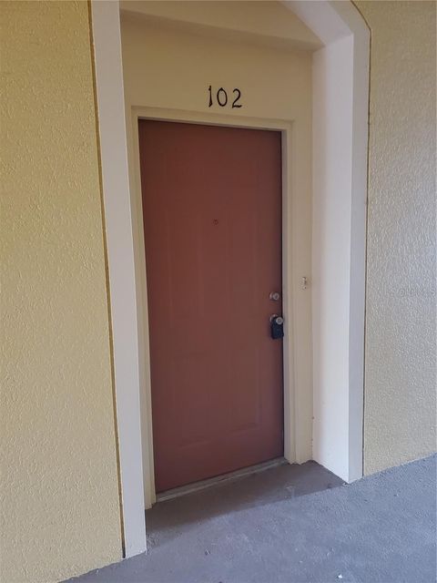 Photo of 6240 Contessa Drive #102, Orlando, FL 32829 (MLS # O6318436)