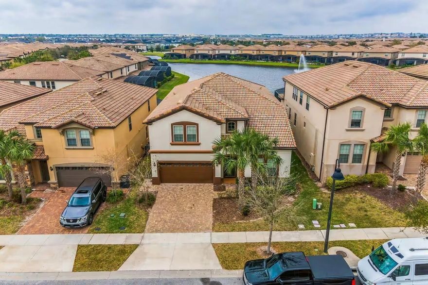 Welcome to 1864 Nice Ct, Davenport, FL - this 8-bedroom, 6-bath, 4,041 sq ft turnkey vacation home at Windsor at Westside is just 20 minutes from Orlando’s top theme parks. Perfect for large groups, this home comfortably sleeps up to 20 guests, offering the ultimate combination of comfort, space, and Florida-style fun.

The open-concept great room brings everyone together with a gourmet kitchen, living, and dining area designed for entertaining or relaxing after a day at the parks. Both the first-floor and second-floor primary suites provide privacy and luxury, while the remaining bedrooms are perfectly set up for groups.

Step outside to your fully enclosed pool and spa with lake views, ideal for sun-soaked afternoons, poolside dinners, or evening relaxation. The home is fully furnished and move-in ready, making it an effortless turnkey option for a second home, vacation rental, or short-term rental investment.

Upstairs, the family room ensures there’s plenty of room for everyone to spread out comfortably and create memories together. 

Windsor at Westside Resort offers resort-style amenities that elevate the vacation experience, including a 10,000 sq ft clubhouse, zero-entry pool with waterslide, lazy river, kid’s splash park, lake and pier, tiki bar & fireplace lounge, fitness center, volleyball courts, and daily maintenance included in the HOA.

This is a rare opportunity to own a fully furnished, move-in-ready, large-group vacation home in one of Orlando’s most sought-after resort communities.

Schedule your private showing today and experience the perfect blend of Florida lifestyle, turnkey convenience, and rental income potential!