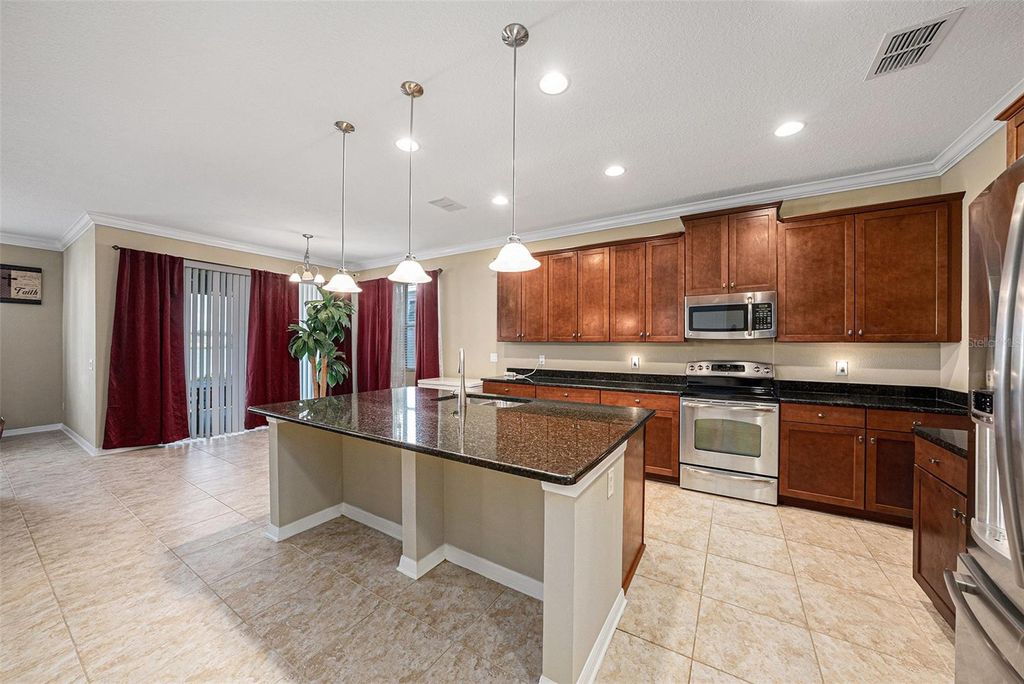 Photo of 10661 Pictorial Park Drive, Tampa, FL 33647 (MLS # TB8442185)