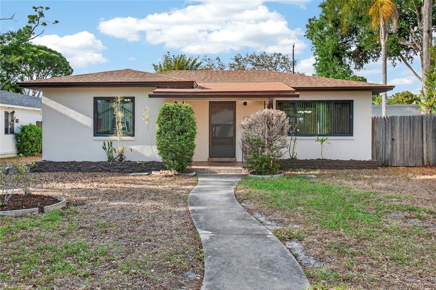 A charming, move-in ready block home that blends comfort and peace of mind. NO FLOOD INSURANCE REQUIRED. This 2-bedroom, 1-bath home features beautiful wood floors and fresh updates inside and out. Enjoy relaxing evenings on the screened back porch with your own jacuzzi. Major systems including the roof, new in 2016, HVAC, new in 2024, and water heater, new in 2021 have all been replaced and the home has already been inspected for added confidence.

Situated on high ground, this property also offers a single-car garage and convenient alley access. You’ll love the easy access to downtown, shopping, dining, and everyday essentials.

Schedule your showing today and see it for yourself!