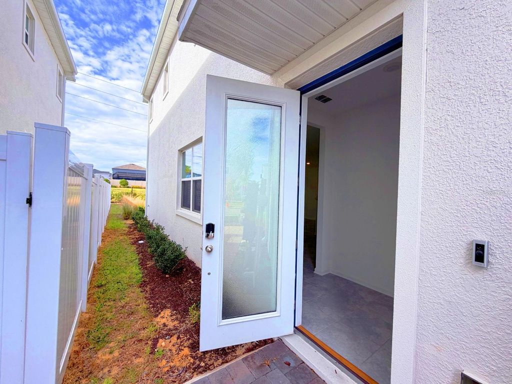 Photo of 398 Bogey Drive, Davenport, FL 33896 (MLS # S5140050)