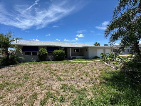 Photo of 5407 Pali Way, St Pete Beach, FL 33706 (MLS # TB8406980)