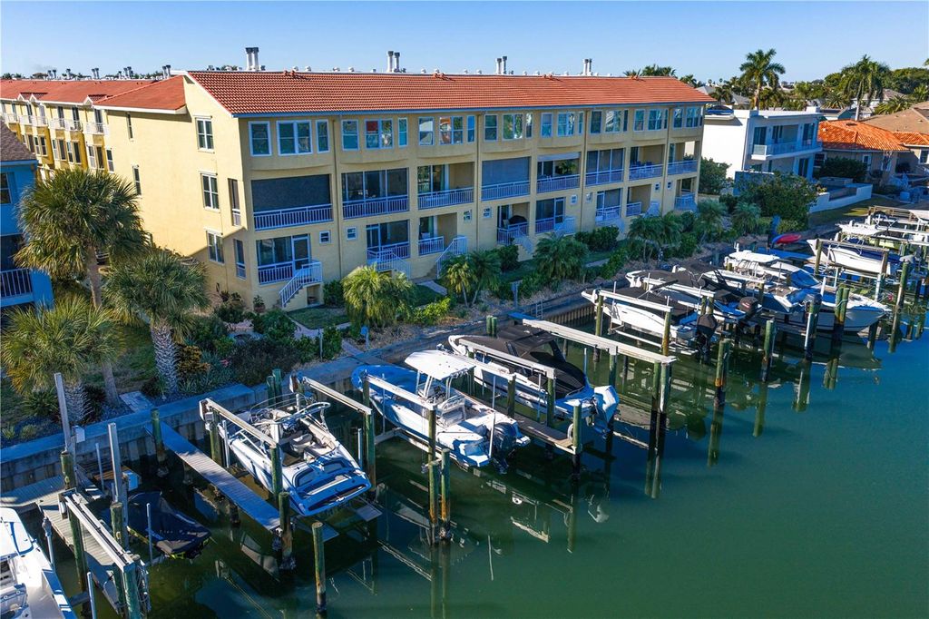 Photo of 1067 Pinellas Bayway S, St Petersburg, FL 33715 (MLS # TB8466165)
