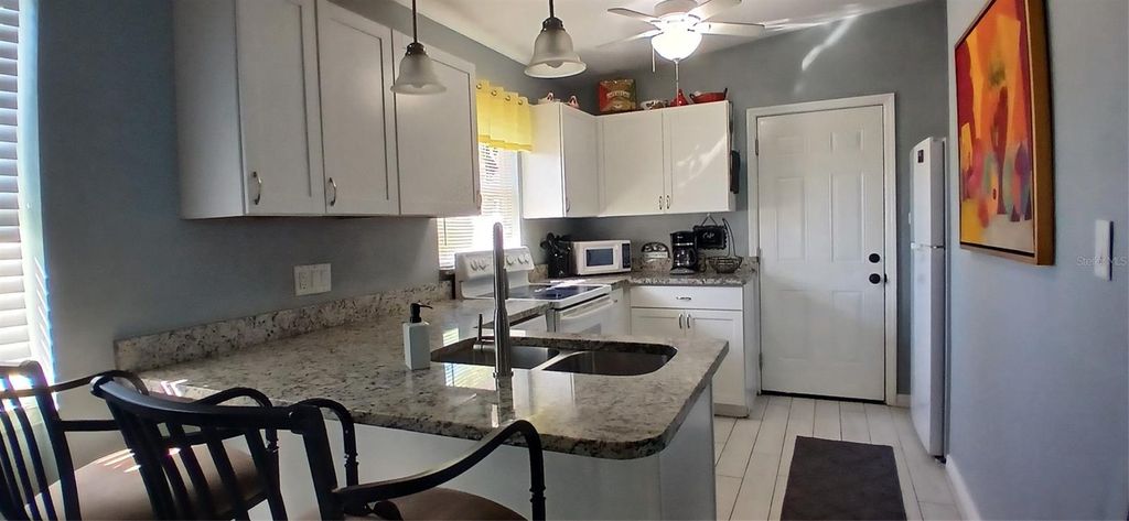 Photo of 115 Duxbury Avenue, Port Charlotte, FL 33952 (MLS # C7519951)