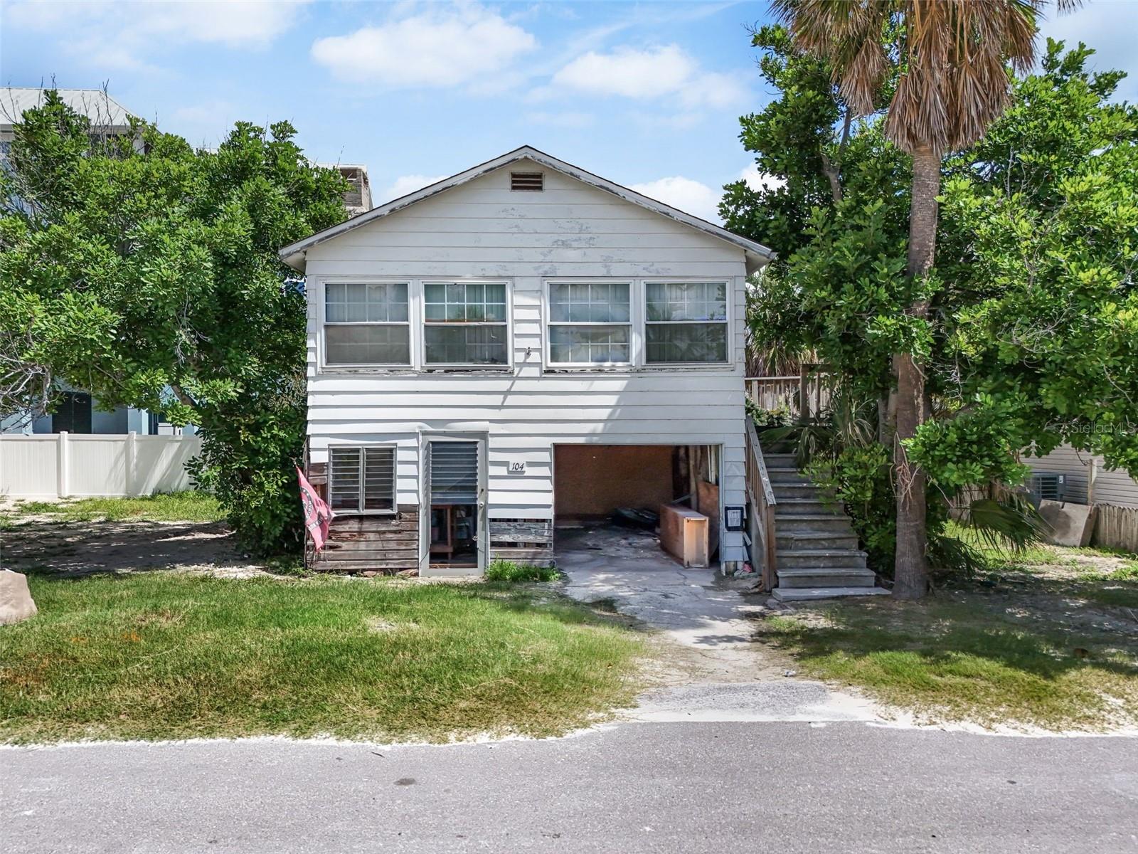 Welcome To Paradise! Own your slice of Anna Maria Island. This parcel of land is waiting for new owners to build their dream home. Current home is a 2 bedroom 1.5 bath home with gulf views from the elevated back deck. The potential is endless. Tear down and build or keep the historic beauty and refurbish this 1930's home!