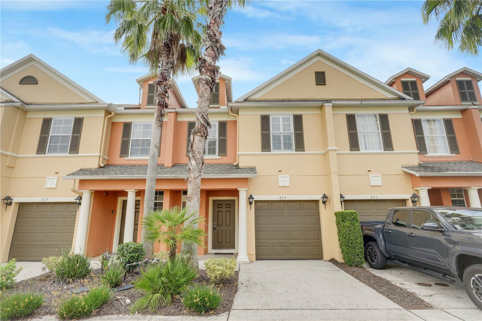 Resort-Style Living Just Minutes from Disney! This charming and well-kept 3-bedroom, 2.5-bath townhome in the highly sought-after gated community of Reunion Resort. From the moment you arrive, you’ll appreciate the peaceful setting and the smart layout that makes everyday living easy and enjoyable.
Step inside to find a bright, open floor plan featuring newer appliances, a full-size washer and dryer, and a one-car garage offering both secure parking and extra storage. Enjoy your morning coffee on the screened private balcony off the upstairs primary suite or unwind on the screened back patio with serene conservation views.
This home’s standout feature? Its unbeatable location — just a short stroll to a private, resort-style pool exclusive to your neighborhood. You’ll also have access to Reunion Resort’s additional amenities like multiple community pools, a fitness center, and convenient on-site dining. (Golf and waterpark access not included.)
Situated just minutes from world-class attractions, shopping, dining, and grocery stores, this townhome offers the perfect balance of comfort, convenience, and luxury living in Central Florida. Live where others vacation — schedule your tour today!