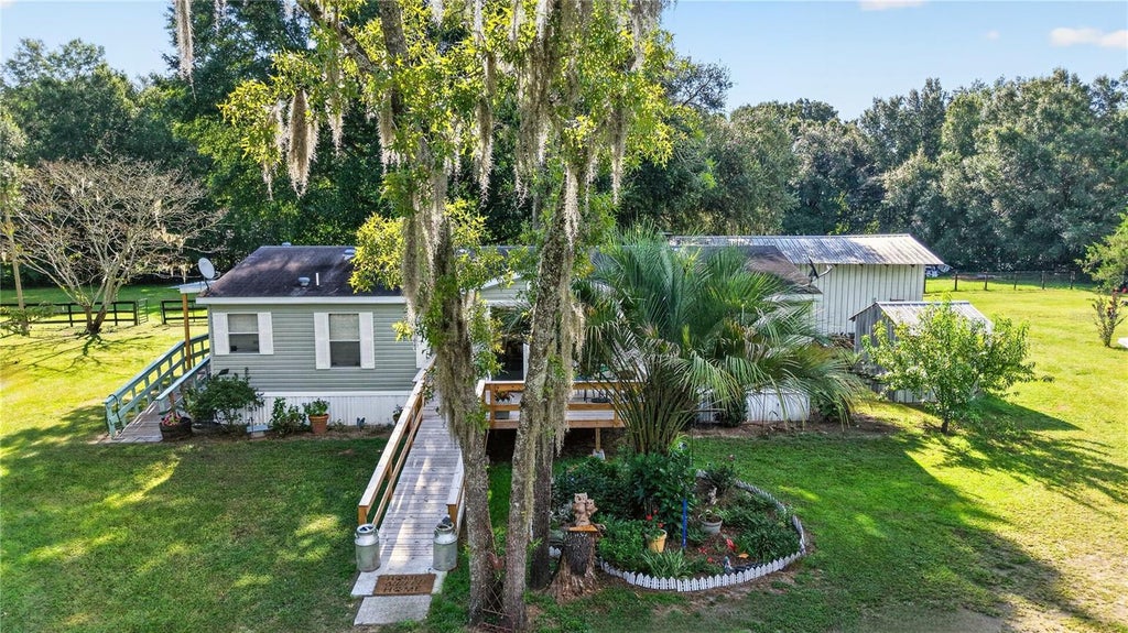 Photo of 6051 SE 148th Terrace, Morriston, FL 32668 (MLS # OM731482)