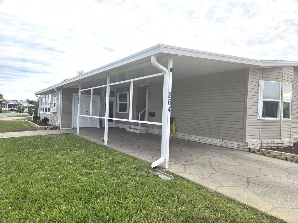 Photo of 264 Ramsgate Way, Haines City, FL 33844 (MLS # P4937504)