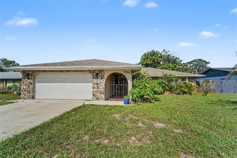 Photo of 11022 Salt Tree Drive, Port Richey, FL 34668 (MLS # TB8544651)