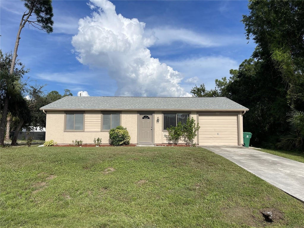 Photo of 907 Red Bay Terrace NW, Port Charlotte, FL 33948 (MLS # C7530538)