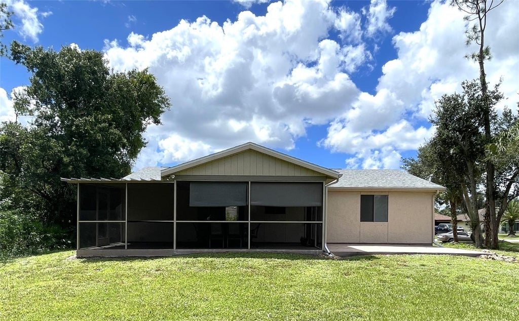 Photo of 907 Red Bay Terrace NW, Port Charlotte, FL 33948 (MLS # C7530538)