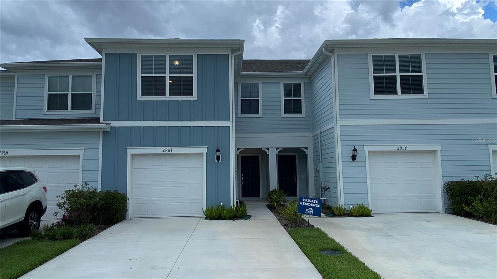Welcome home to 2961 Clever Lane in the gated Grayson Square community in Winter Park! This beautifully constructed 3 bedroom, 2.5 bath townhome has one car garage. As you enter the home, you are welcomed into the kitchen overlooking the living area. Enjoy your spacious and entertaining kitchen with classic cabinetry and stainless steel appliances including the refrigerator, range, over the range microwave and dishwasher. The powder room is located on the first floor, easily accessible for guests. Continuing upstairs, the owner's suite is spacious featuring private access to the owner's bath and walk in closet. Both additional bedrooms are well sized with easy access to the second full bath. Rounding out this home is the interior laundry room, equipped with full sized washer and dryer. Enjoy the proximity to all HOA amenities! This home will not last long.