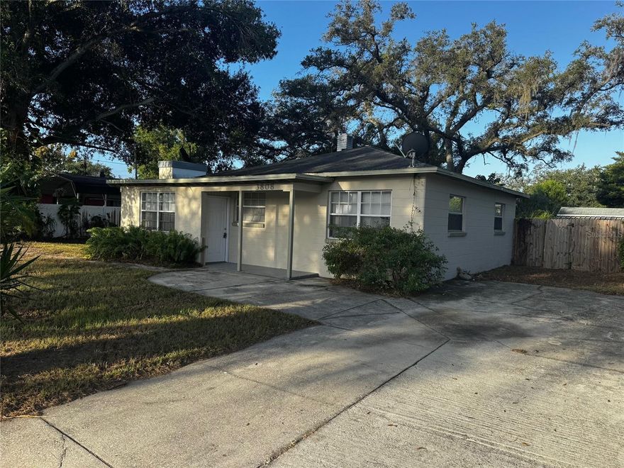 This mid-century concrete block home provides a blend of character with practical living. With 3-bedroom, 1-bathroom this residence offers a comfortable layout with approximately 917 square feet of living space, making it easy to maintain while still feeling spacious. Situated on a large double lot, the property features a fully fenced yard—perfect for enjoying the outdoors, entertaining, or relaxing in privacy. The home also includes a front paver patio and a double parking pad, providing both curb appeal and convenient off-street parking. With durable construction, central A/C, and a fantastic location in the Grant Park area, this home offers excellent value for renters seeking a well-built property with plenty of outdoor space and easy access to Tampa’s shops, restaurants, and major roadways.