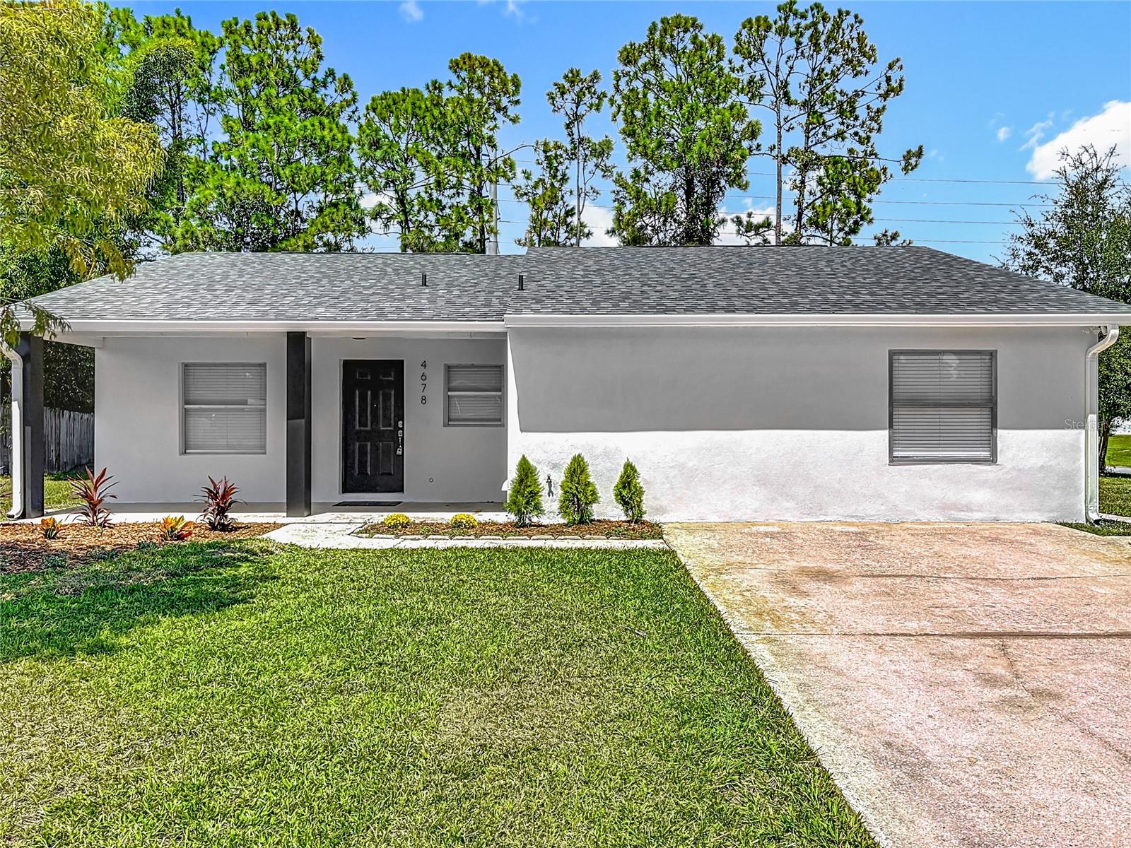 Completely Remodeled 3-Bedroom Home with Modern Finishes
This beautifully renovated 3-bedroom, 2-bathroom home offers 1,652 sq. ft. of living space with thoughtful upgrades throughout. Step inside to find an open layout with all-new luxury vinyl plank flooring, a spacious bonus living area, and a versatile extra room perfect for a home office or hobby space.
The brand-new kitchen is a showstopper, featuring solid wood cabinetry, quartz countertops, and stainless steel appliances. Both bathrooms have been completely updated with new tile, vanities, and fixtures for a fresh, modern feel. (Missing one upper cabinet, to be installed 09/06)
The Roof and A/C are brand new, both installed August 2025.
Additional highlights include a dedicated laundry room, fresh stucco with new exterior paint, and a large storage shed in the backyard. The property backs up to a peaceful stream with no rear neighbors, offering both privacy and tranquility.
This move-in ready home combines style, comfort, and functionality—everything you’ve been looking for!