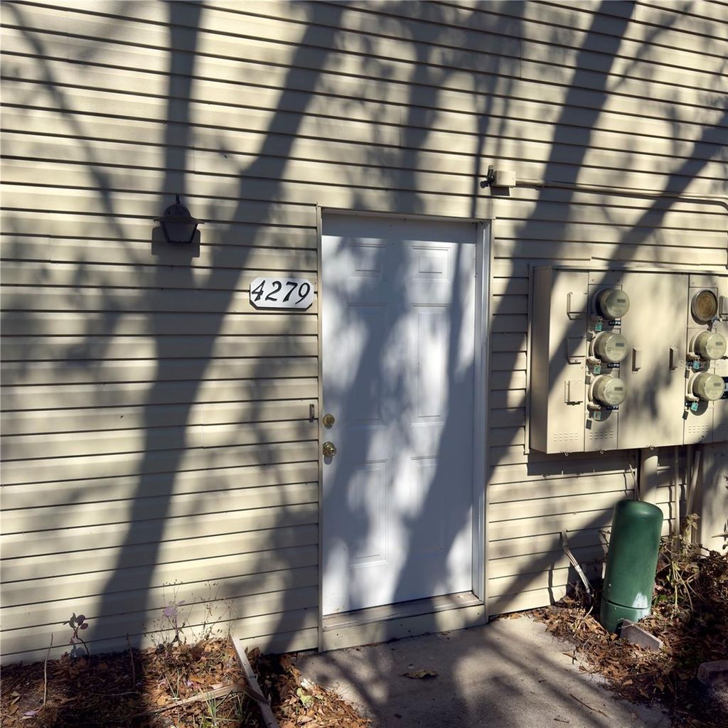 Photo of 4279 Pinebark Avenue #4, Orlando, FL 32811 (MLS # O6378876)