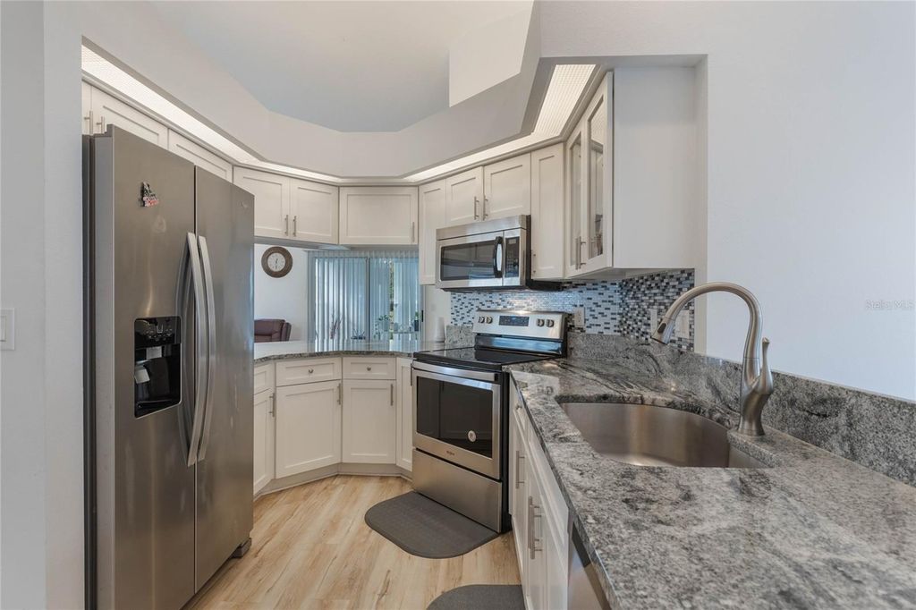 Photo of 615 Juniper Way, Tavares, FL 32778 (MLS # O6403133)
