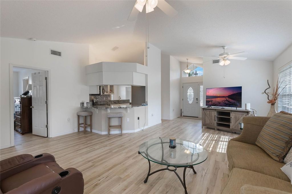 Photo of 615 Juniper Way, Tavares, FL 32778 (MLS # O6403133)