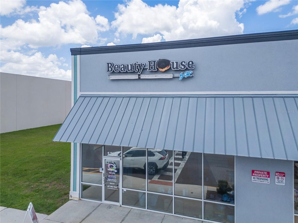 Photo of 13550 Village Park Drive #360, Orlando, FL 32837 (MLS # O6415940)
