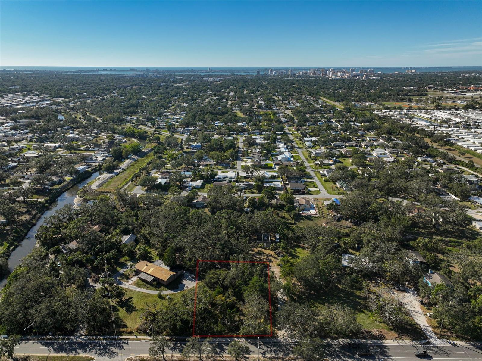**Oversized .38 Acre Lot Now Available!** Excellent Sarasota location near Pinecraft, Beaches, Dining, Shopping, Downtown Sarasota, the Legacy Trail and more! A great opportunity to build your dream home or vacation getaway. There was once a home on this vacant lot so the utilities are accessible ensuring a smooth start to your building journey. World-famous Siesta Key Beach is approximately 7 miles away and Lido Key Beach is about 10 miles away. For those who appreciate the outdoors, Arlington Park, Nathan Benderson Park, and numerous local golf courses offer endless recreational possibilities.
Shopping enthusiasts will delight in the proximity to Westfield Siesta Key Mall, Sarasota Square Mall, and a plethora of local boutiques. Culinary adventures abound with an array of restaurants featuring local seafood, international cuisine, and casual eateries.
Cultural and educational enrichment is within easy reach, thanks to nearby landmarks such as Marie Selby Botanical Gardens, Sarasota Opera, and The Ringling Museum. Healthcare needs are seamlessly met, with Sarasota Memorial Hospital and various clinics close at hand. Strategically positioned, this property boasts quick access to I-75, facilitating effortless travel to Tampa or Fort Myers. Sarasota-Bradenton Airport is approximately 8 miles away, adding to the convenience of this exceptional location.
Discover the perfect foundation for your future in this rapidly growing area, where the promise of increasing property values and a lifestyle of unparalleled comfort and convenience await. Your Sarasota dream starts here!