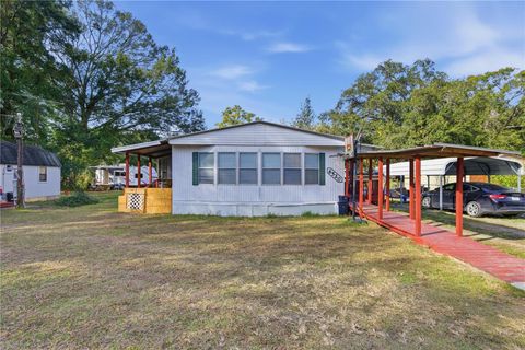Photo of 6520 NE 23rd Avenue, Ocala, FL 34479 (MLS # OM716424)