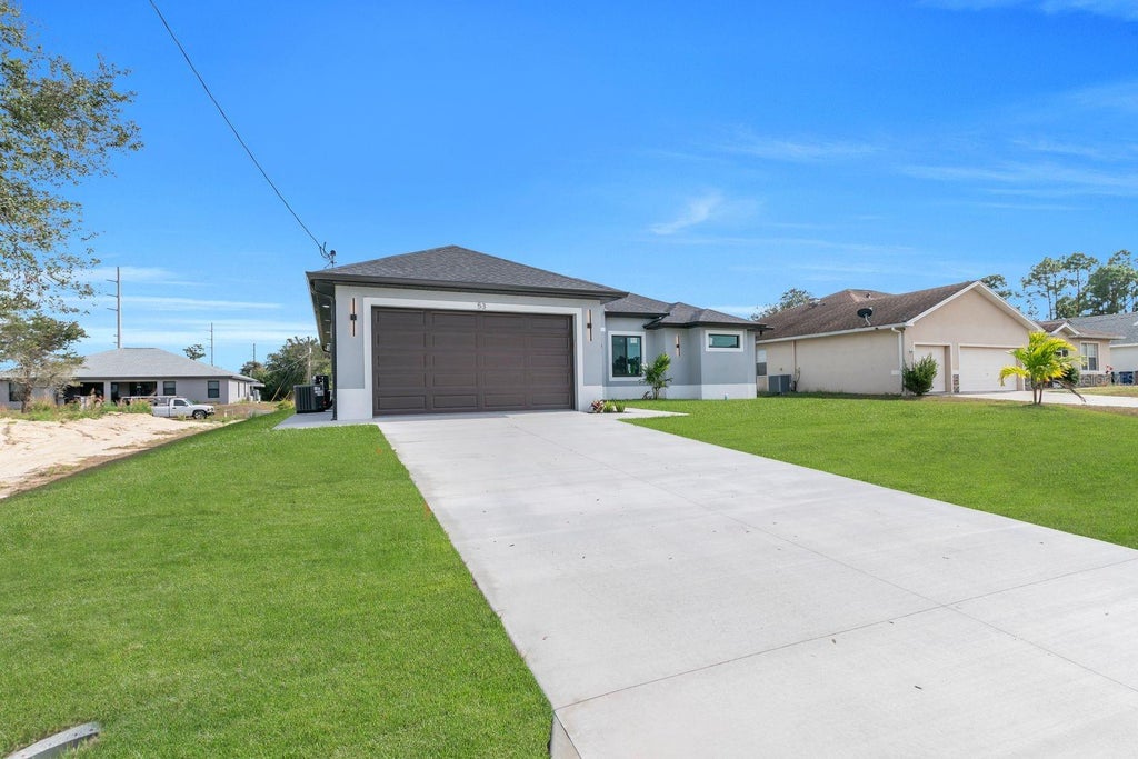 Photo of 53 Susan Avenue S, Lehigh Acres, FL 33976 (MLS # A4705190)