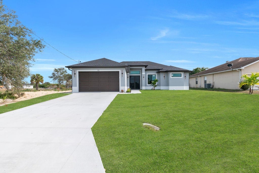 Photo of 53 Susan Avenue S, Lehigh Acres, FL 33976 (MLS # A4705190)