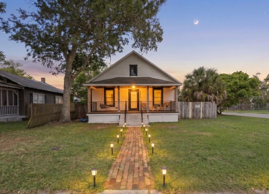 BUYER GOT COLD FEET, SO BACK ON MARKET!!  AC 2023 - ROOF 2018 - BOTH BATHROOMS REMODELED 2024 - GOLF CART INCLUDED!

Step into the charm and character of old Florida living with this beautifully maintained 1900-built home in the heart of historic Sanford — *without the restrictions of the Historic District!* Offering 3 bedrooms, 2 bathrooms, and 1,346 square feet of living space, this one-of-a-kind property blends timeless craftsmanship with modern convenience.

From the moment you arrive, the inviting front porch with a classic porch swing welcomes you home. Inside, you'll fall in love with the tall ceilings, original hardwood floors throughout most of the home, intricate trim details, and stunning wood ceilings that showcase the home's historic character and warmth.

The kitchen features white shaker cabinets, stainless steel appliances, tile flooring, and a breakfast bar overlooking the formal dining room — creating the perfect setup for entertaining or everyday living. Cozy up beside the natural gas fireplace or enjoy cooking with the gas stove, adding both charm and functionality.

Outside, the fully fenced backyard provides privacy and room to relax, while the corner lot offers additional curb appeal and space. Located just minutes from vibrant downtown Sanford — and only a short golf cart ride away — you’ll enjoy easy access to local restaurants, breweries, shopping, nightlife, waterfront activities, and community events.

Sanford is experiencing an incredible resurgence, making this the perfect opportunity to own a piece of history in one of Central Florida’s most exciting and rapidly growing communities.