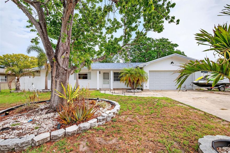 Welcome to this beautifully fully updated Clearwater home, where modern upgrades, serene views, and everyday convenience come together. This 3-bedroom, 2-bath residence showcases new flooring, fresh interior paint, real wood cabinetry, updated bathrooms, and stylish finishes throughout, creating a bright and inviting space with true turnkey appeal. The open-concept layout is filled with natural light and flows effortlessly into the living and dining areas, ideal for entertaining or relaxed daily living. The renovated kitchen offers quality cabinetry, ample prep space, and excellent functionality for today’s lifestyle.

Step outside and enjoy the home’s peaceful water view overlooking a spring-fed pond, offering a tranquil backdrop rarely found at this price point. Whether enjoying morning coffee, evening sunsets, or simply unwinding after a long day, the calming waterfront setting creates a true private retreat. The spacious backyard also offers room to entertain, garden, or even add a future pool while taking in the beautiful natural scenery.

Conveniently located just minutes from Belleair, Downtown Clearwater, shopping, dining, Morton Plant Hospital, Clearwater Beach, and major commuter routes, this home delivers the perfect combination of full updates, peaceful views, and prime location. A rare opportunity to own a move-in-ready waterfront gem in the heart of Clearwater.

**HOME IS OCCUPIED - PLEASE SCHEDULE APPOINTMENT 24 HOURS PRIOR**