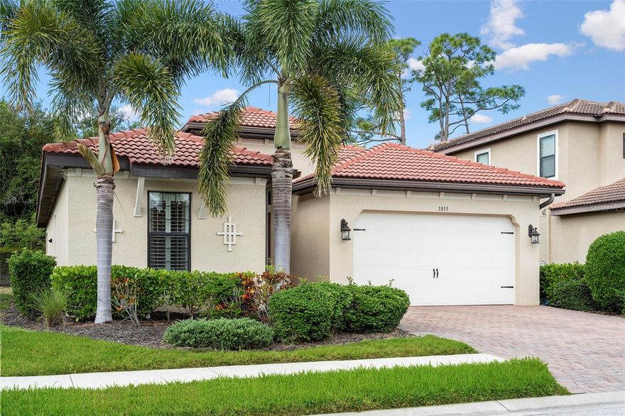 Welcome to this beautifully maintained Pembroke model in the sought-after gated community of Calusa Park. This home offers true Florida living with exceptional style and comfort—inside and out! 
Step outside and you’ll immediately notice the extra-wide driveway and stately Foxtail palms that set the tone for the quality you’ll find throughout. Inside, the home boasts large tile flooring in main living areas, plantation shutters, and crown molding throughout, including elegant tray ceiling accents. The closets provide ample organization and storage.
The open split floor plan centers around a spacious great room and a modern kitchen featuring granite countertops, solid wood cabinetry with under-cabinet lighting, and a convenient pantry. A whole-house surge protector offers added peace of mind.
Step through to the paver lanai, where you can unwind and enjoy the private backyard oasis—perfect for outdoor dining, grilling, or relaxing in the Florida sunshine. There’s plenty of room to add a pool if desired!
The two-car garage is complete with an epoxy-finished floor and an emergency backup electrical panel for your generator.
Located in the maintenance-free community of Calusa Park, residents enjoy access to a heated pool and cabana, all with low HOA fees and no CDD.
Why wait to build when you can move right into this impeccably cared-for home—without builder delays or added costs?
Ideally situated between quaint Venice and vibrant Sarasota, Calusa Park offers easy access to U.S. 41, I-75, beaches (just few miles away), and historic downtown Venice. Plus, enjoy access to the Legacy Trail, perfect for biking, walking, or running from your community straight into Venice or Sarasota.