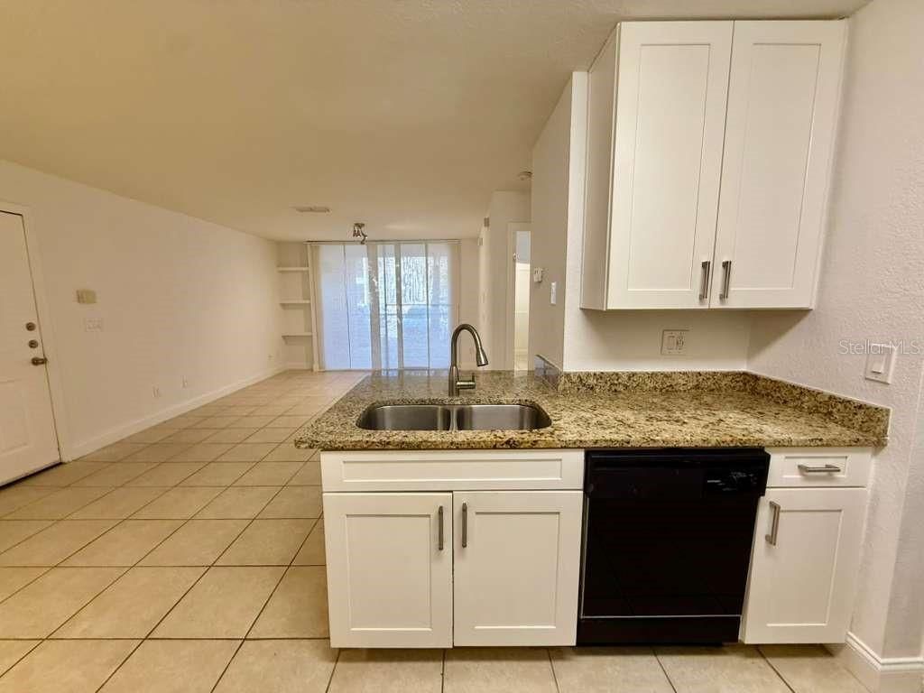 Photo of 7630 Pissarro Drive #16105, Orlando, FL 32819 (MLS # O6384147)