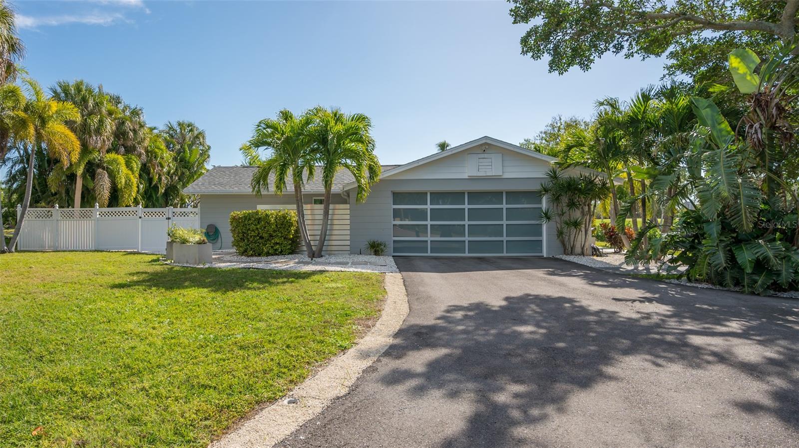 Booked May 1st- June 16th, July13th-July 27th, Nov 14th-rest of 2025. Charming, waterfront Longboat Key surprise! This 2 bedroom 2 bath house is sure to impress. Total renovation will bring you delight upon entering. Every detail was thought out from kitchen to bathrooms. Fun, chic, beach inspired decorating with the fun, splattered octopus theme to bring a smile to anyone. Plenty of dishware, gadgets, cooking equipment for the gourmet chef in you all. Outdoor living could be your everyday enjoyment while sipping wine by your private heated pool and on cool nights curl up at the fire pit. Sit back and relax with many seating areas and full outdoor dining table in this cozy beach themed oasis in Country Club Shores. Quiet sought out neighborhood on south end of Longboat Key with beach access between LBK Club and Beach Place. It is fully equipped with everything you will need to feel at home while enjoying the sights and comforts that Longboat Key has to offer. Just minutes to St Armand’s Circle or Lido Beach for shopping, fine dining or laying at the public beach with all your favorite people. Longboat is known for their waterfront golf, fine dining and luxury resorts. In fact, its 12 miles of white sand beaches have helped to make this a luxury Gulf Coast resort community. There are numerous Activities and Attractions in the Sarasota/Bradenton/Siesta area. -Just a few of the many treasures and cultural events are Benderson Park, Mote Marine Aquarium, Ringling Museum of Art, fishing charters out of Marina Jack's, Florida's Largest Wildlife Rescue / Rehabilitation Center with the Pelican Man, Selby Botanical Gardens, and the Van Wezel.