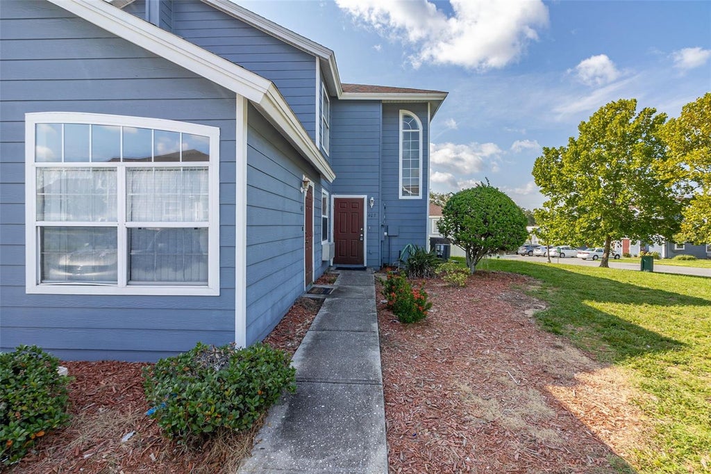 Photo of 403 Orchid Drive, Davenport, FL 33897 (MLS # O6432216)