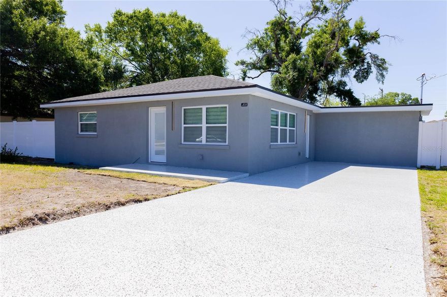 !!LOCATION, LOCATION, LOCATION! Just steps away from Midtown Tampa and mere minutes from Downtown Tampa, International Plaza, and Tampa International Airport, this home enjoys a prime location in one of the city's most coveted and rapidly growing central districts. Enjoy immediate access to world-class dining, shopping, and entertainment options—all while residing in a high-demand area that continues to appreciate in value. Situated at 2710 W Cypress St, Tampa, FL 33609, this stunning property features modern designer finishes, an open-concept layout flooded with natural light, and bright, airy living spaces designed for both comfort and functionality. Completely renovated in 2026, this home boasts an entirely new electrical system (2026), new plumbing fixtures (2026), and a brand-new HVAC system (2026). It features IMPACT-resistant windows throughout the home, as well as brand-new interior and exterior doors (2026). Additional upgrades include luxurious waterproof laminate flooring in every room and fresh paint both inside and out. Every detail has been meticulously updated to provide a truly move-in-ready experience. The beautifully redesigned kitchen stands out with its quartz countertops, sleek and spacious cabinetry, and a full suite of brand-new appliances (2026), creating the perfect space for both daily living and entertaining guests. The bathroom has been fully renovated with modern finishes, offering a clean, contemporary design. The roof was replaced in 2024. On the exterior, the property features a spacious driveway with parking for two vehicles and a fully fenced yard, offering privacy, security, and the flexibility to enjoy outdoor living. Ready for immediate occupancy and ideal as either a primary residence or an investment opportunity in a high-demand location.