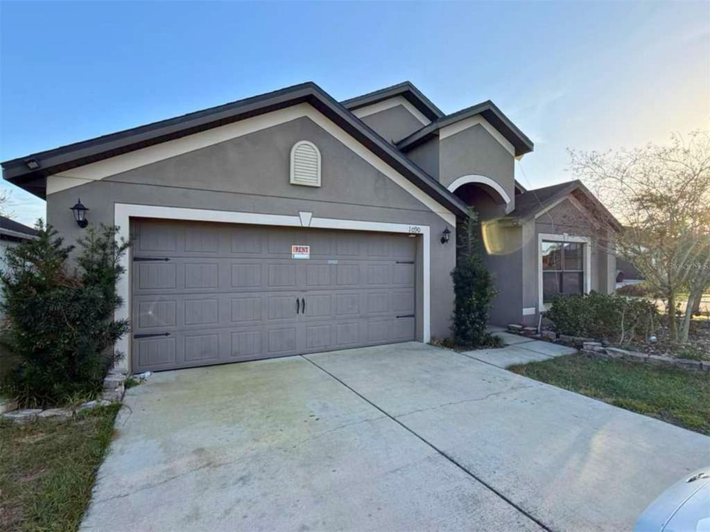 Photo of 1090 Woodlark Drive, Haines City, FL 33844 (MLS # O6394445)