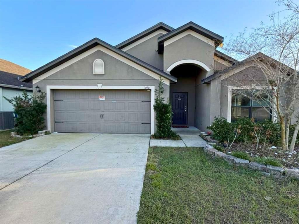 Photo of 1090 Woodlark Drive, Haines City, FL 33844 (MLS # O6394445)