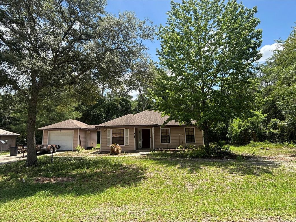 Photo of 5813 SE 230th Terrace, Hawthorne, FL 32640 (MLS # GC540783)