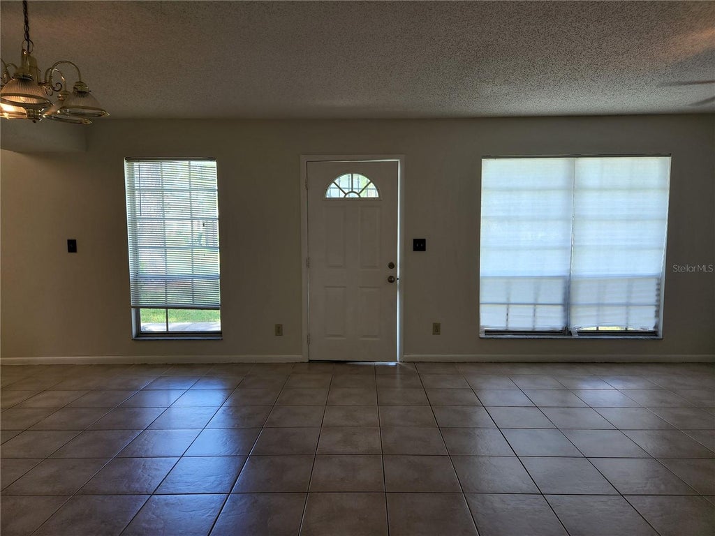 Photo of 7925 Toler Court #2, Orlando, FL 32822 (MLS # O6444128)