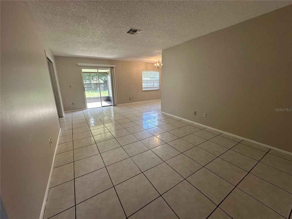 Photo of 7925 Toler Court #2, Orlando, FL 32822 (MLS # O6444128)